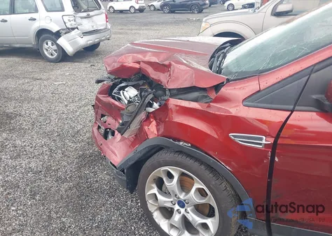 2014 Ford Escape Titanium z USA, uszkodzony, nr VIN 1FMCU9J99EUD14681